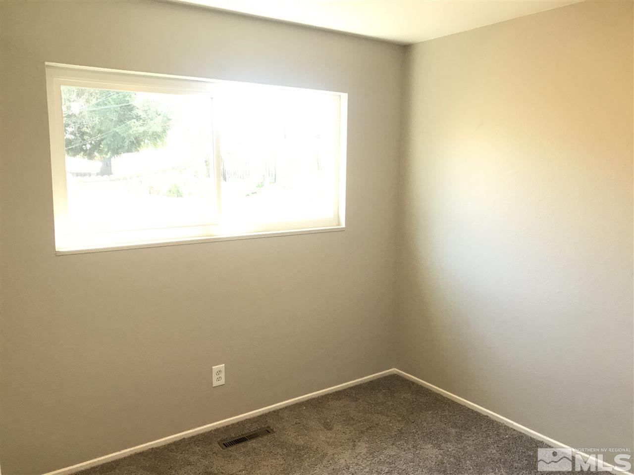 1480 Elizabeth Street Reno, NV 89509 - Photo 9 of 16 an empty room with a window