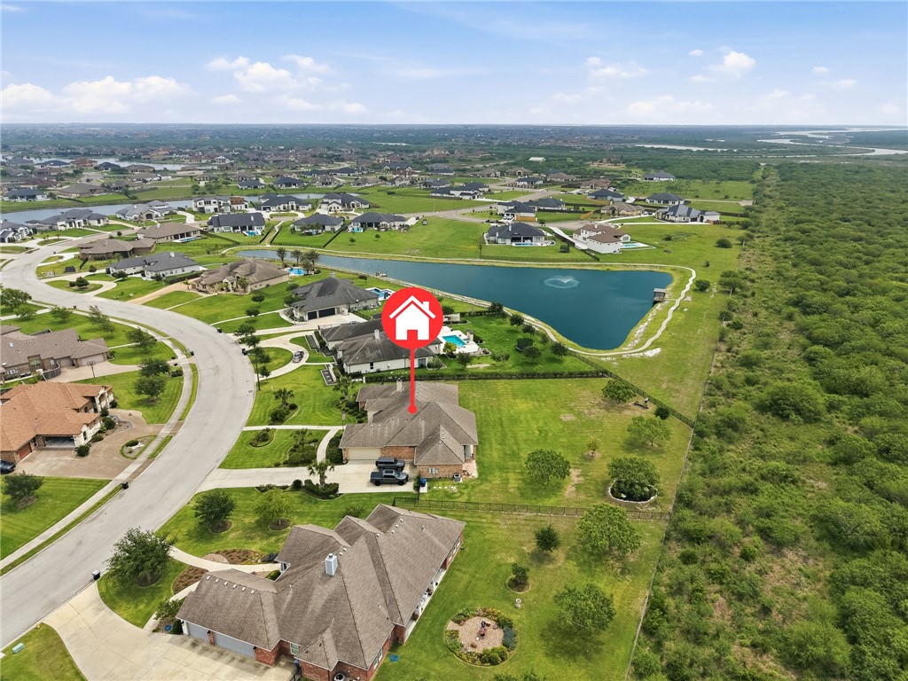 8710 KIng Ranch Drive Corpus Christi, TX 78414 - Photo 32 of 38 a view of a lake in middle of the town