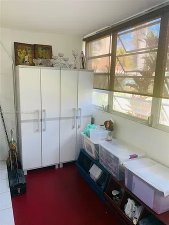 a room with storage and utility