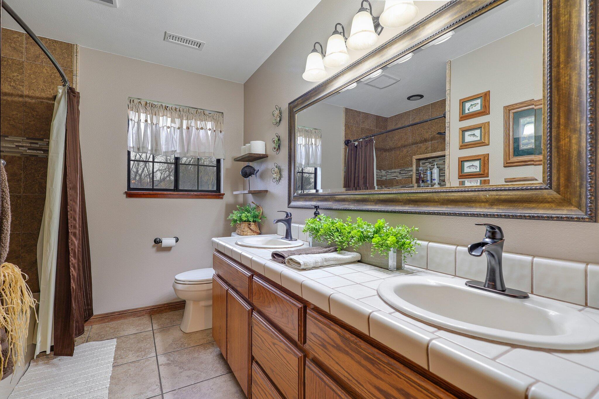 22405 Lone Tree Road Anderson, CA 96007 - Photo 30 of 49 Double sinks in main bathroom