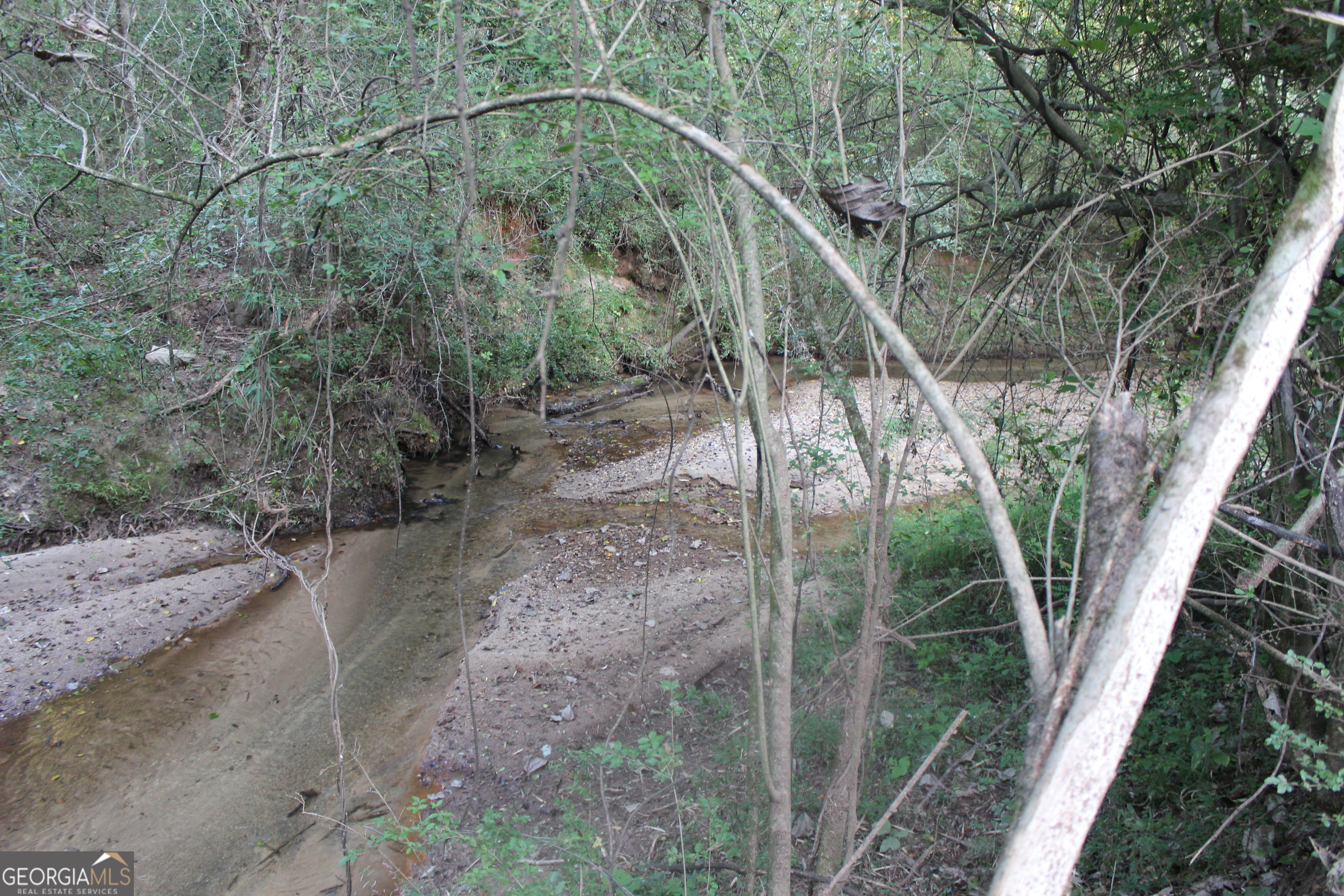 0 Jefferson Road Statham, GA 30666 - Photo 20 of 37 a backyard of a house with lots of green space