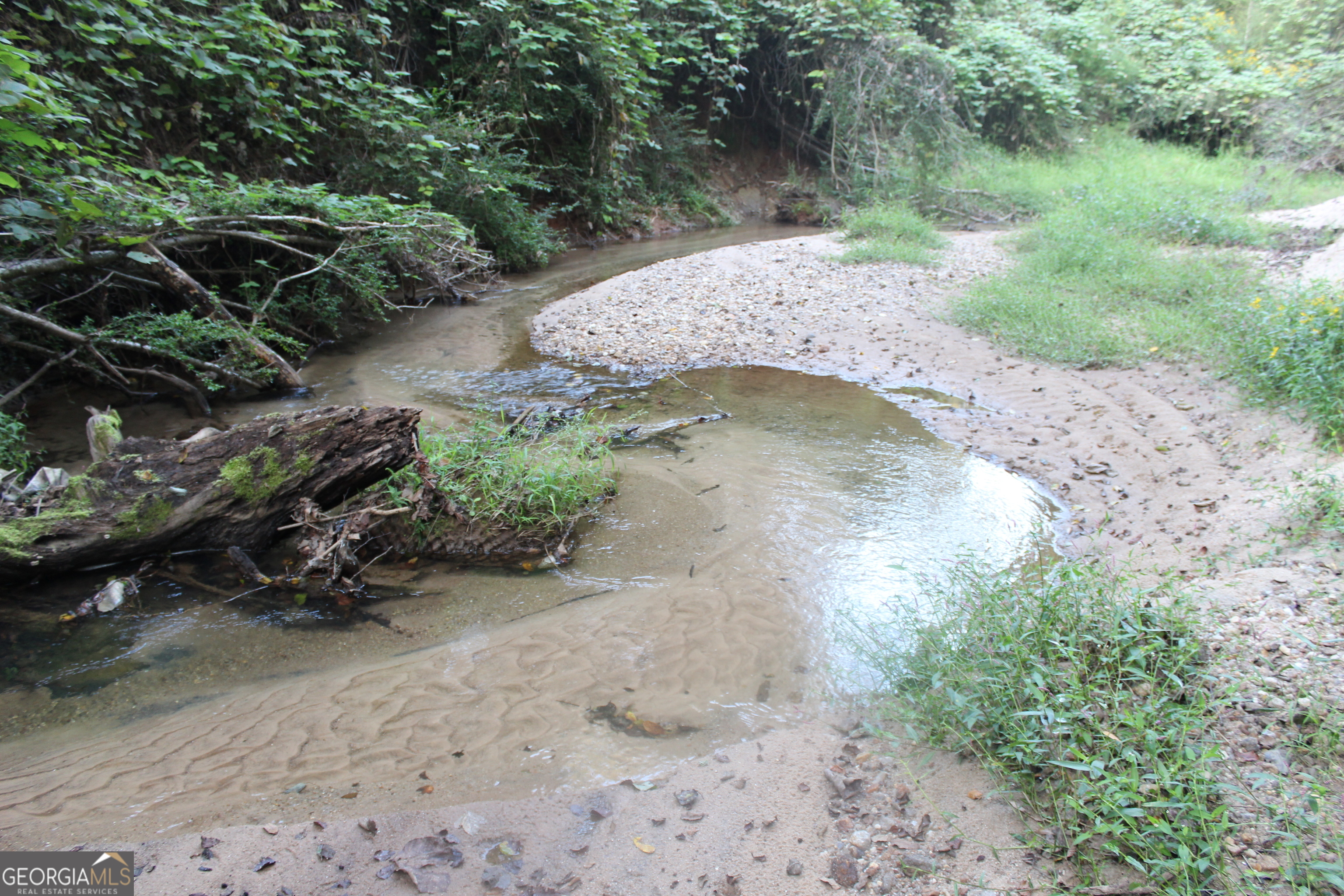 0 Jefferson Road Statham, GA 30666 - Photo 33 of 37 a view of a water pond with green space