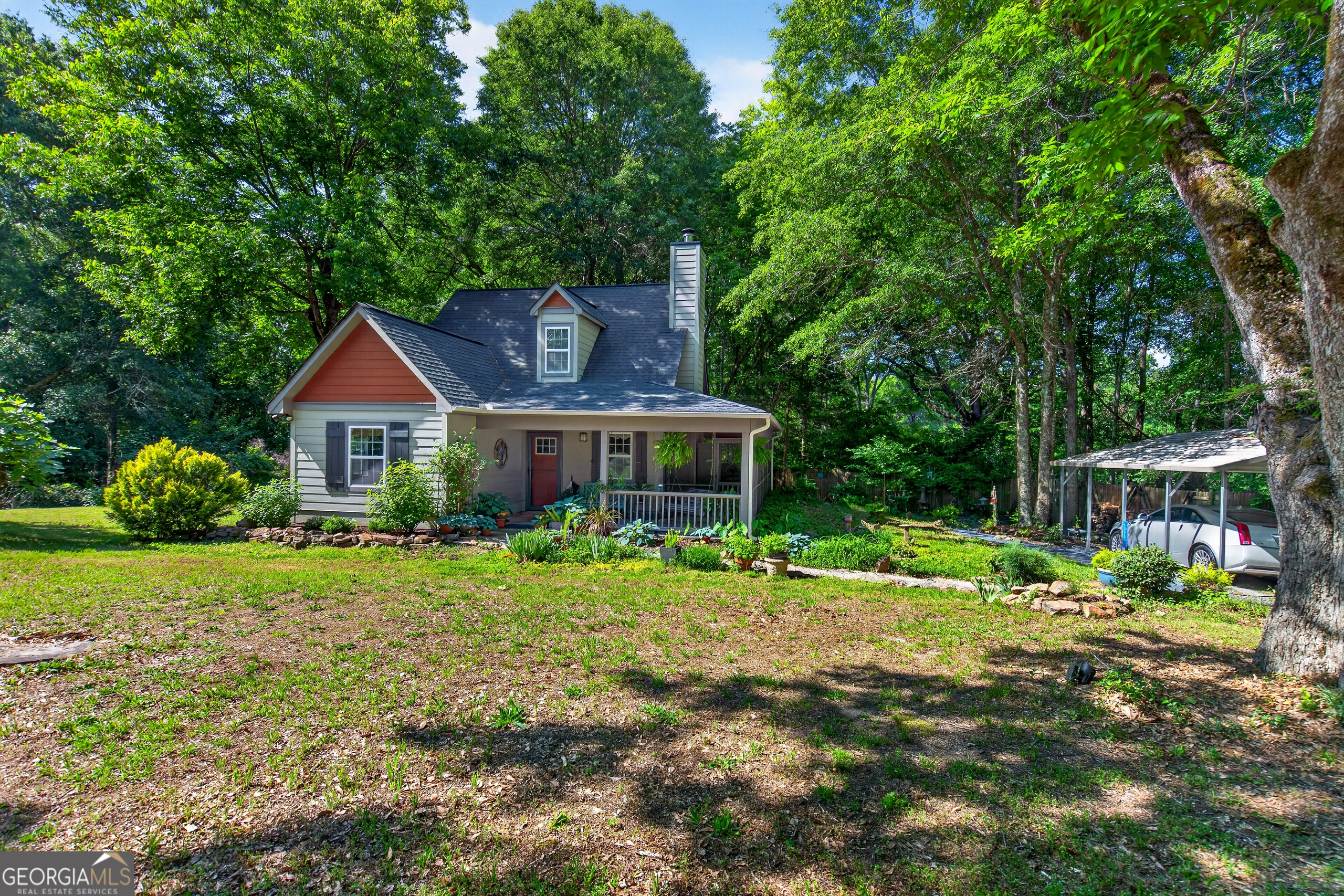 4656 Greenville Road LaGrange, GA 30241 - Photo 4 of 34 a front view of a house with garden