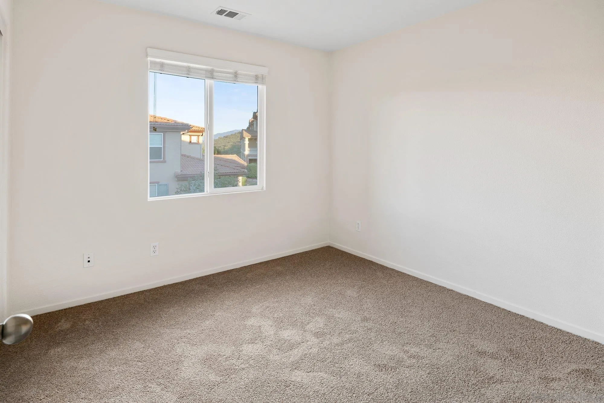 1402 Calabria Street Santee, CA 92071 - Photo 23 of 40 an empty room with a window