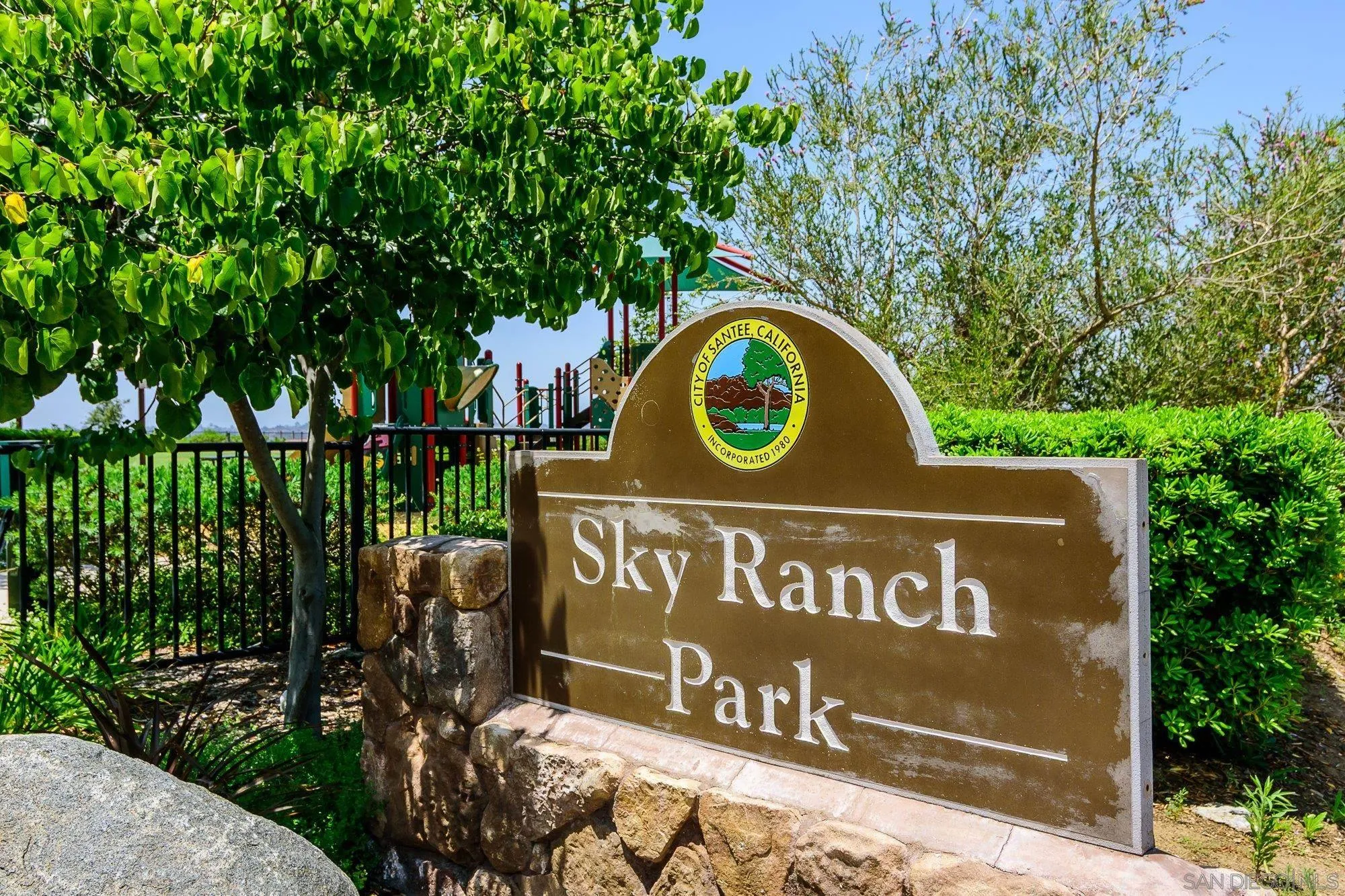 1402 Calabria Street Santee, CA 92071 - Photo 39 of 40 a sign that is on the wall of a building