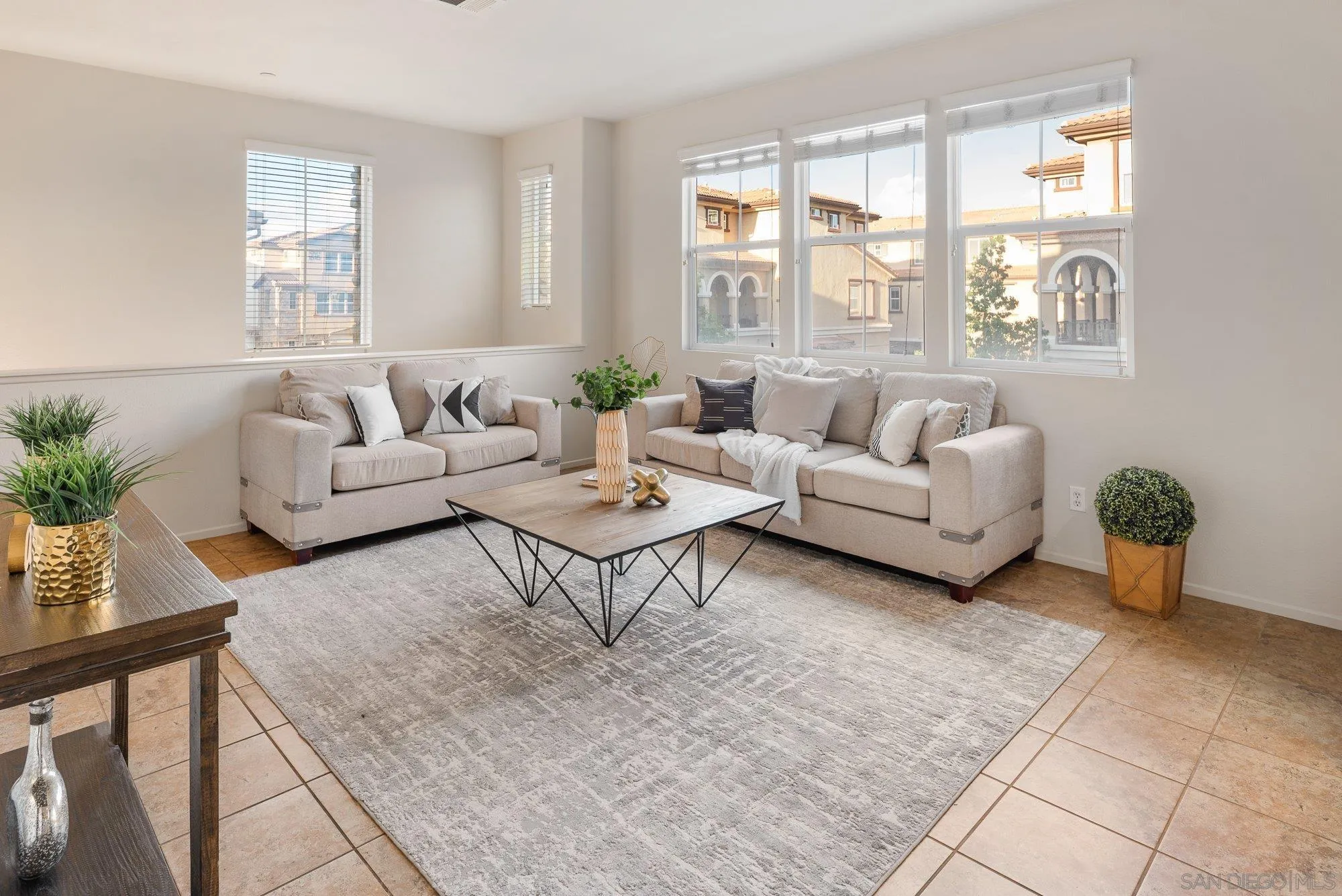 1402 Calabria Street Santee, CA 92071 - Photo 6 of 40 a living room with furniture and floor to ceiling windows