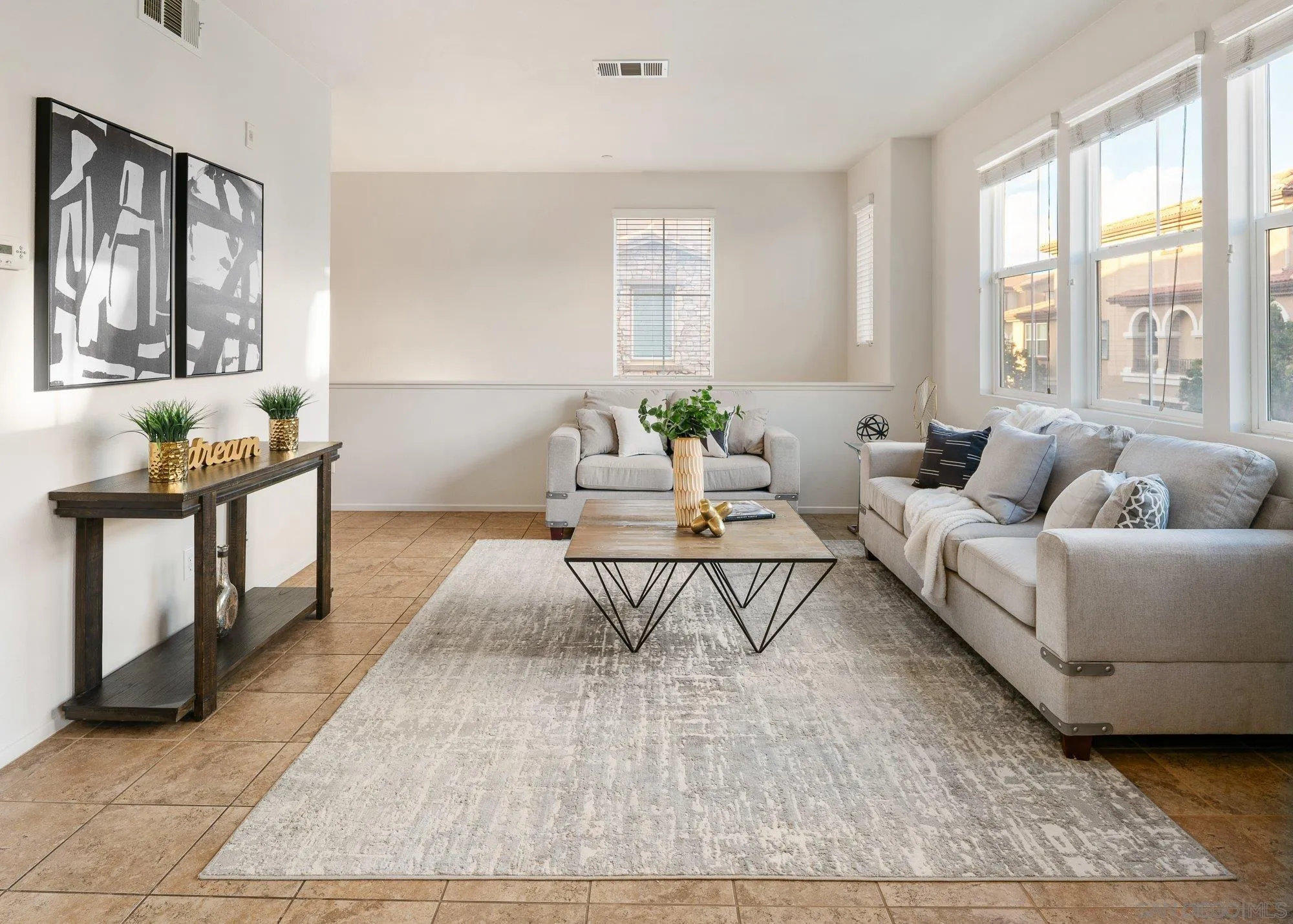 1402 Calabria Street Santee, CA 92071 - Photo 7 of 40 a living room with furniture and wooden floor