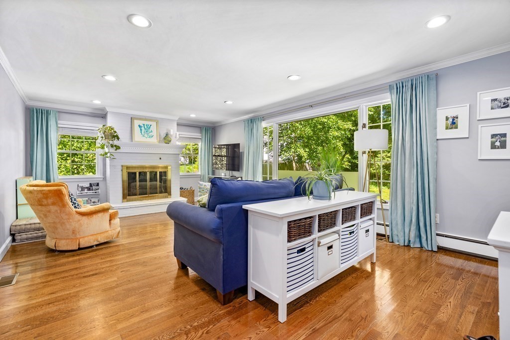 1 Harvest Lane Hingham, MA 02043 - Photo 19 of 42 a living room with furniture and a fireplace