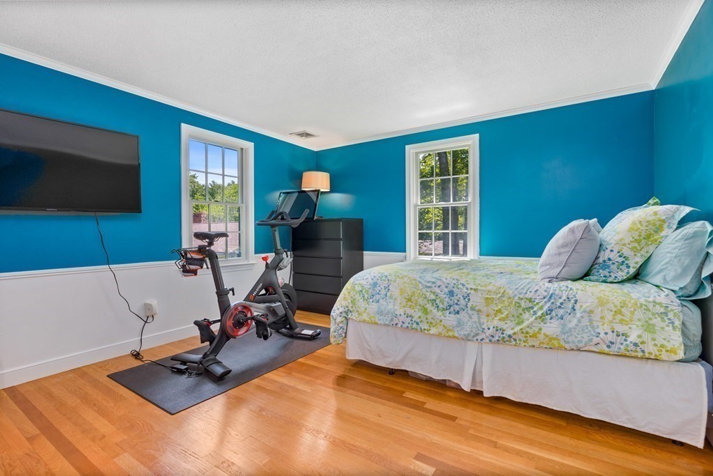 1 Harvest Lane Hingham, MA 02043 - Photo 26 of 42 a living room with furniture and a flat screen tv