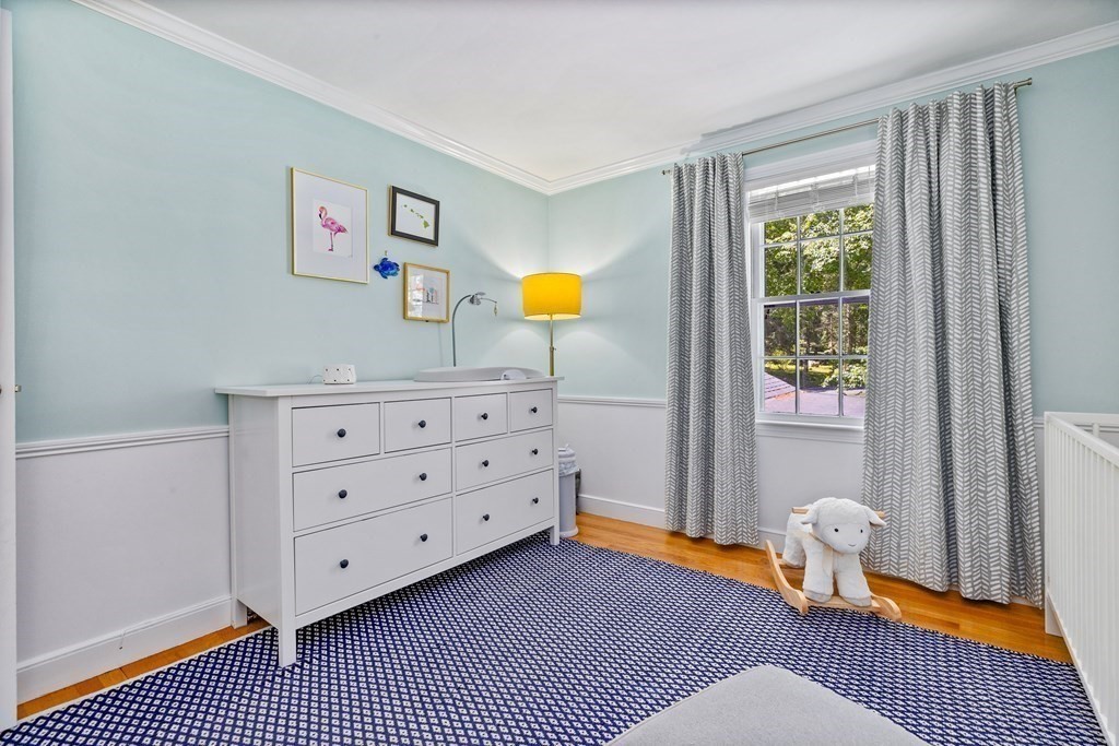 1 Harvest Lane Hingham, MA 02043 - Photo 29 of 42 a bedroom with a bed and wooden floor