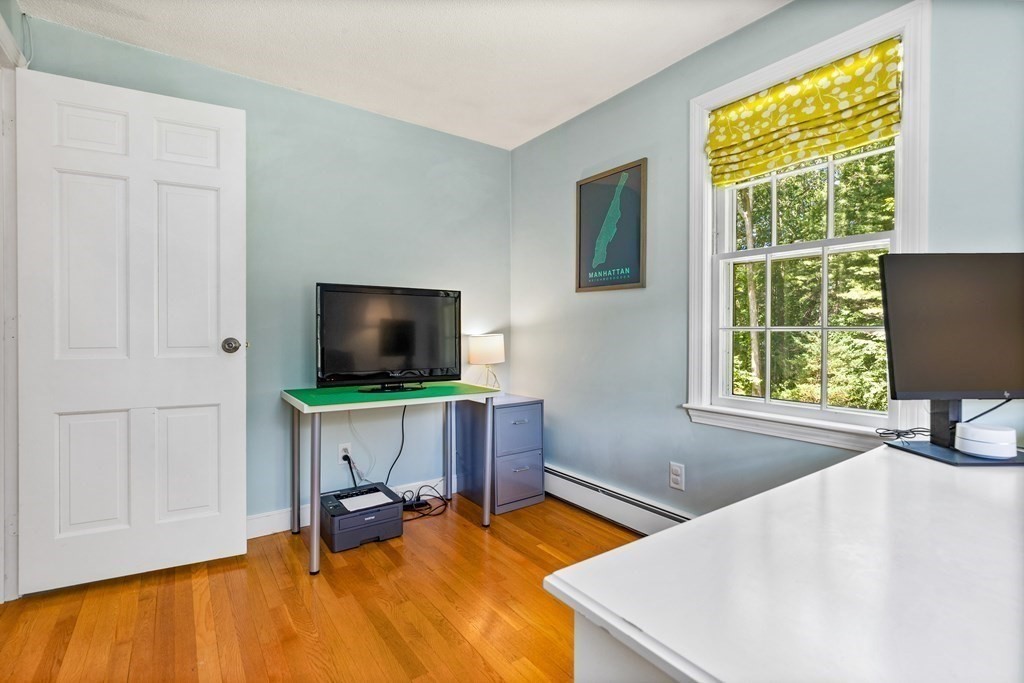 1 Harvest Lane Hingham, MA 02043 - Photo 31 of 42 a room with furniture and a flat screen tv