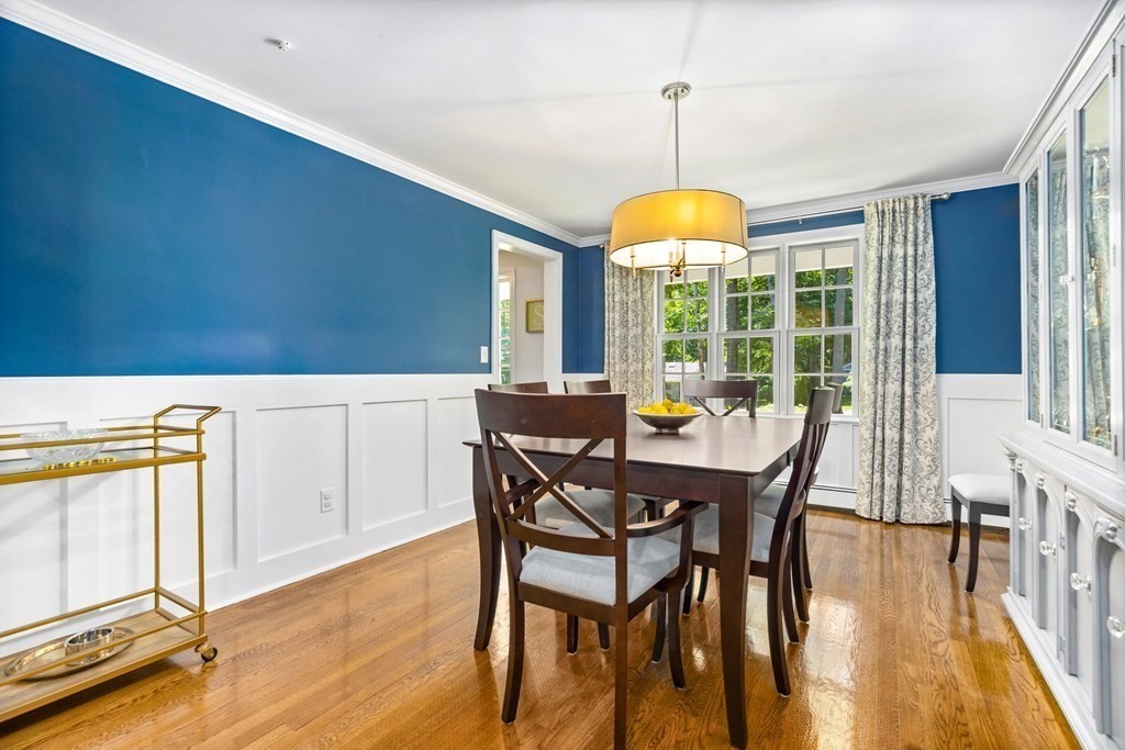 1 Harvest Lane Hingham, MA 02043 - Photo 10 of 42 a view of a dining room with furniture window and wooden floor