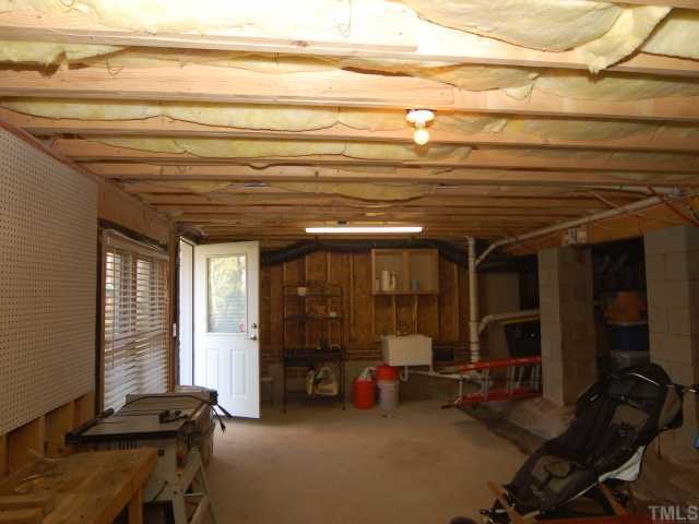5313 Levering Mill Road Apex, NC 27539 - Photo 11 of 12 a view of a room with gym equipment