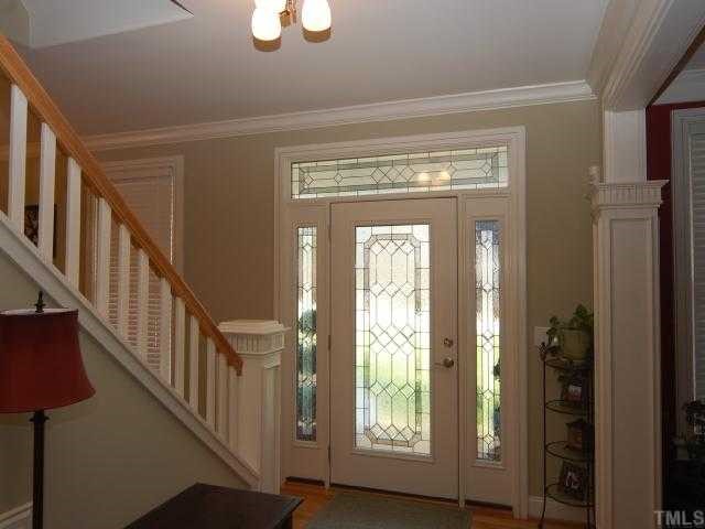 5313 Levering Mill Road Apex, NC 27539 - Photo 2 of 12 a view of an entryway with wooden floor