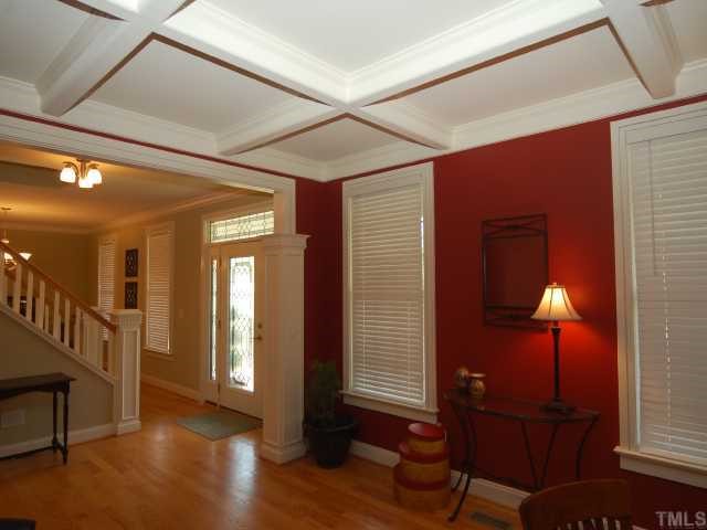 5313 Levering Mill Road Apex, NC 27539 - Photo 3 of 12 a view of a livingroom with furniture and a lamp