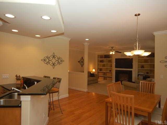 5313 Levering Mill Road Apex, NC 27539 - Photo 7 of 12 a room with furniture and a wooden floor