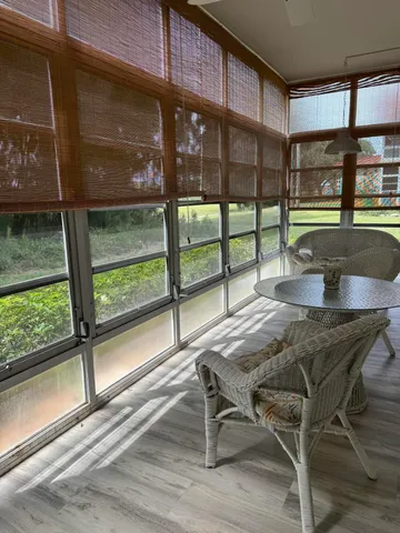 a bedroom with a bed and a mirror