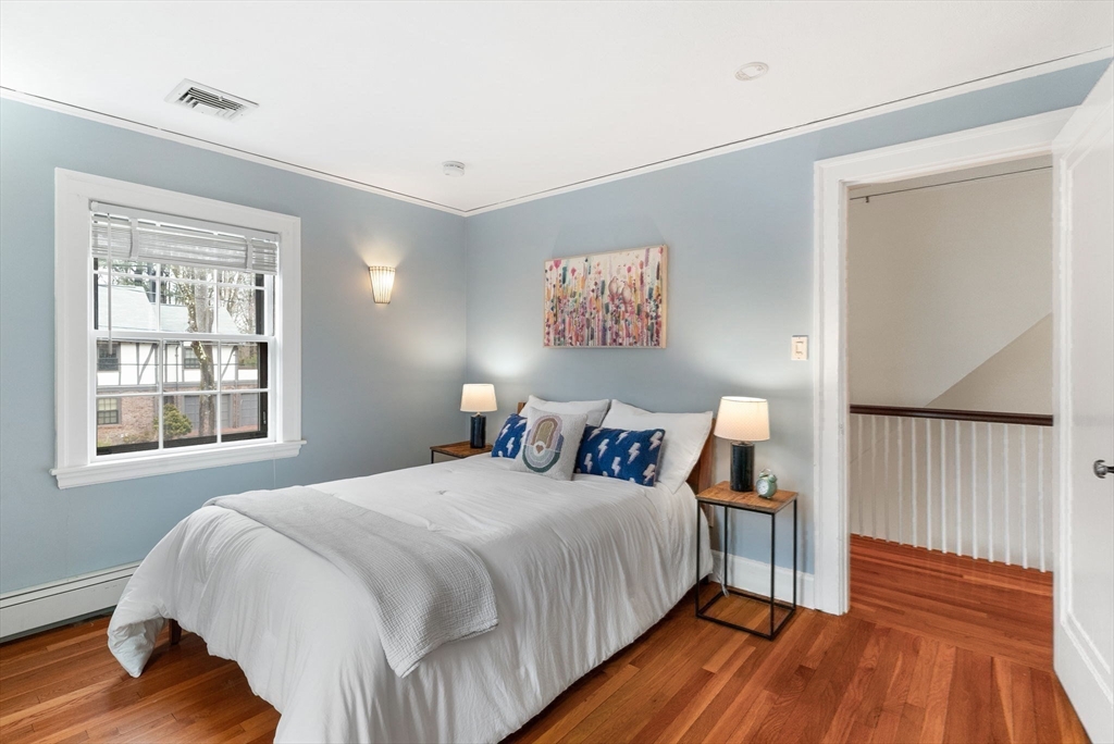 17 Cochituate Road Newton, MA 02461 - Photo 26 of 42 a bedroom with bed and wooden floor