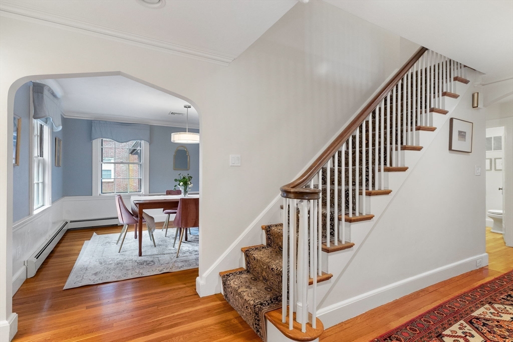 17 Cochituate Road Newton, MA 02461 - Photo 4 of 42 a view of entryway and hall with wooden floor