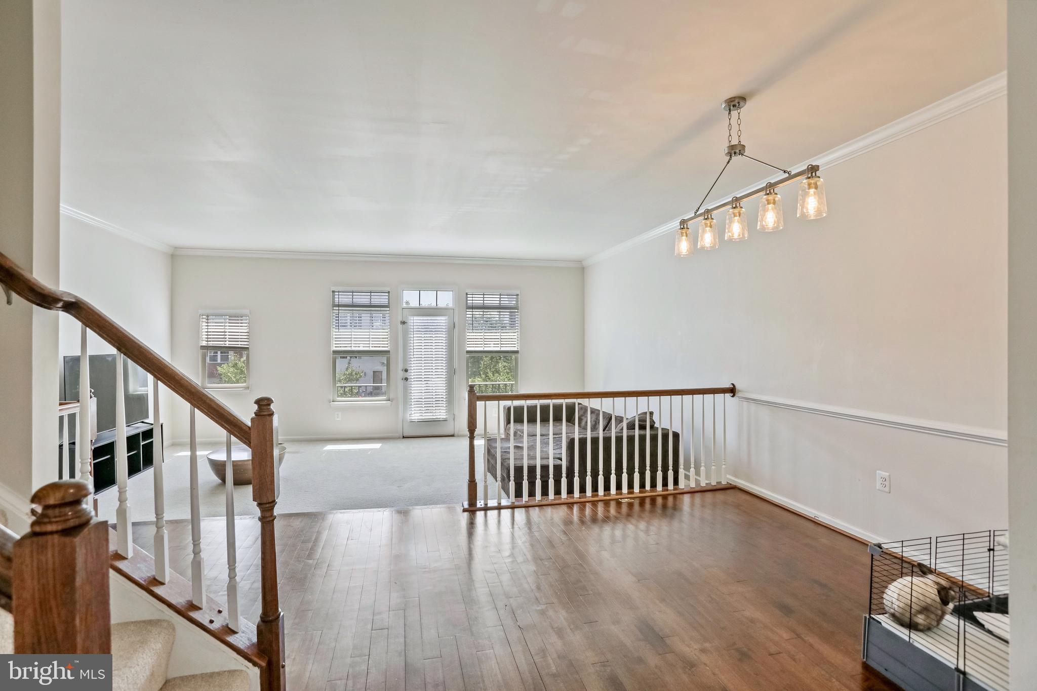 123 Short Branch Road Stafford, VA 22556 - Photo 12 of 33 a view of a hallway with wooden floor and staircase