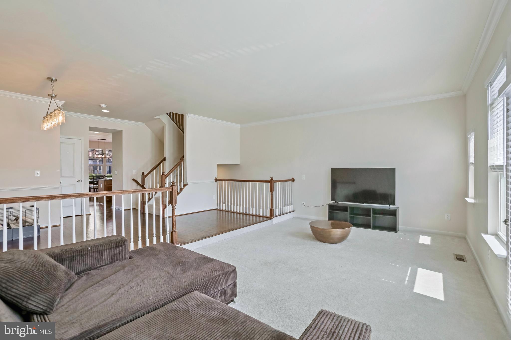 123 Short Branch Road Stafford, VA 22556 - Photo 14 of 33 a bedroom with furniture and a flat screen tv