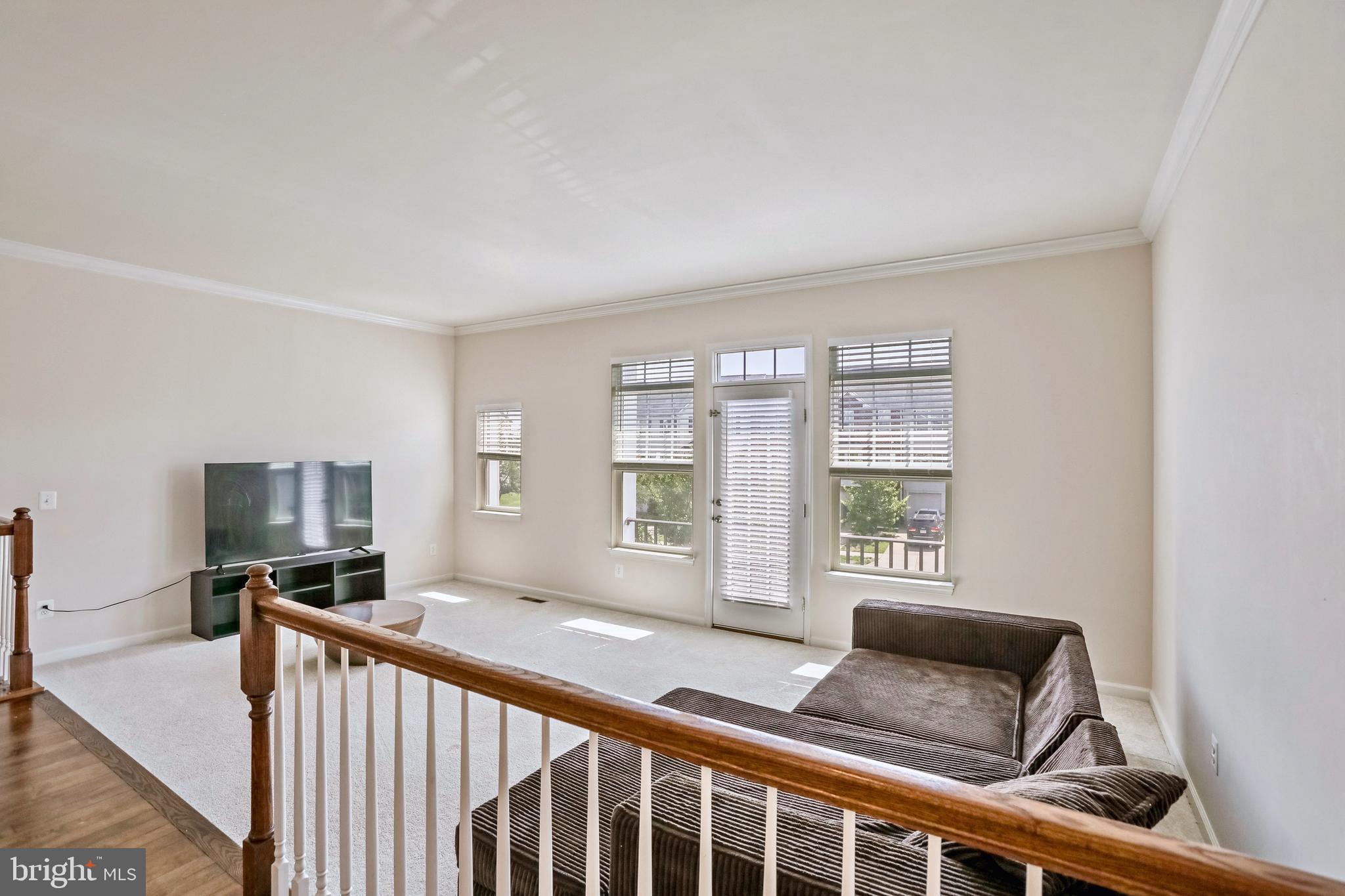 123 Short Branch Road Stafford, VA 22556 - Photo 15 of 33 a living room with furniture and a flat screen tv