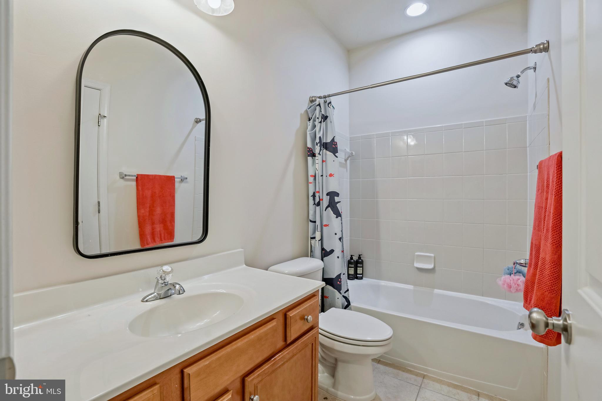 123 Short Branch Road Stafford, VA 22556 - Photo 23 of 33 a bathroom with a sink and a mirror