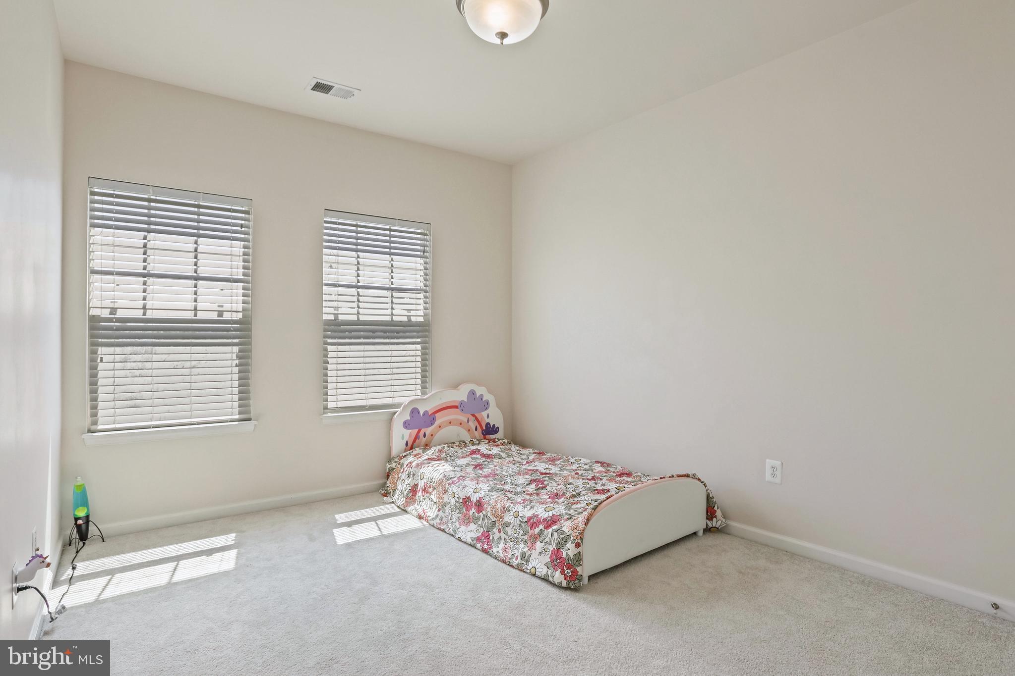 123 Short Branch Road Stafford, VA 22556 - Photo 24 of 33 a bedroom with a bed and a window