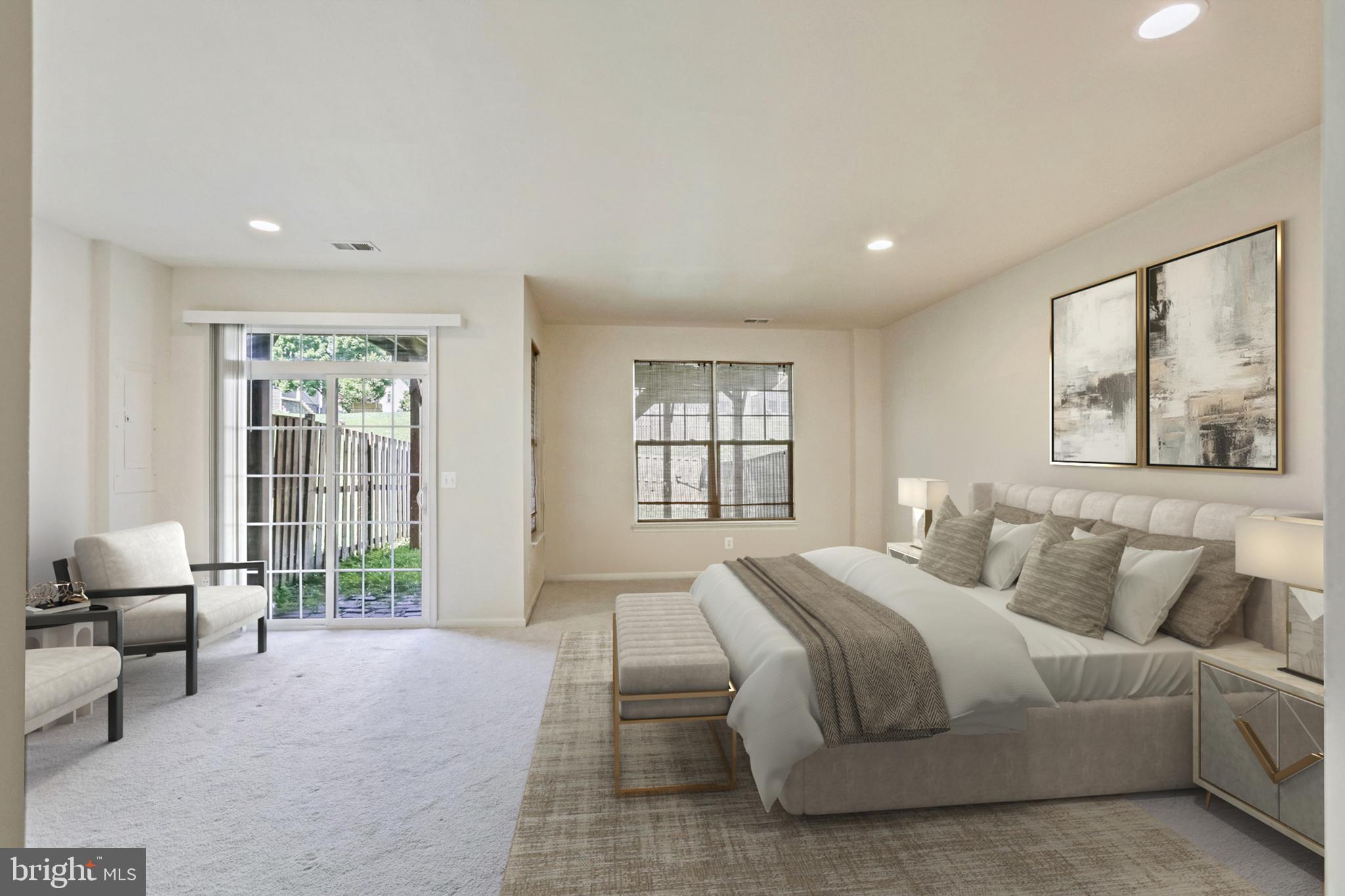 123 Short Branch Road Stafford, VA 22556 - Photo 27 of 33 a spacious bedroom with a large bed and a large window