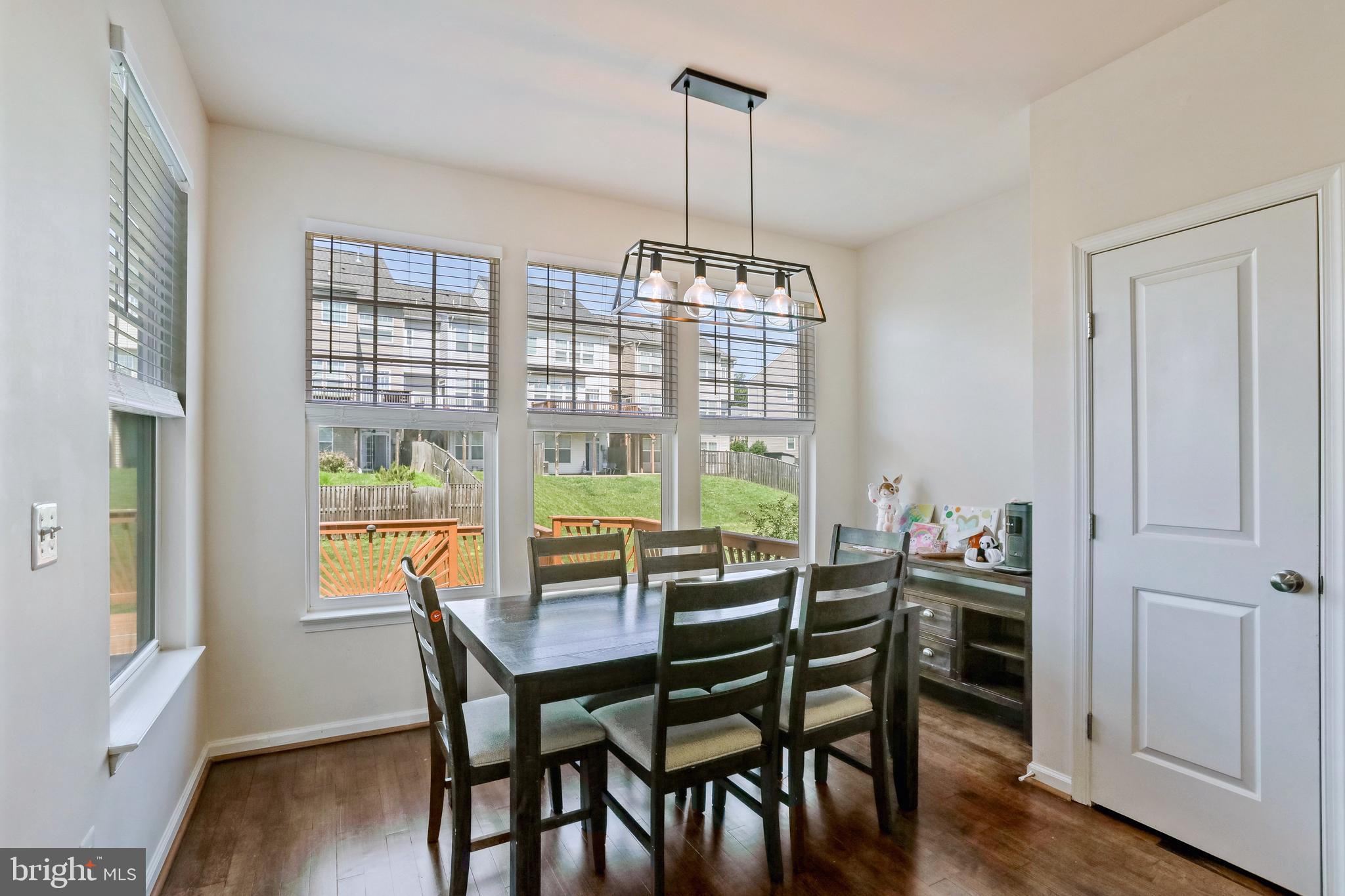 123 Short Branch Road Stafford, VA 22556 - Photo 9 of 33 a view of a dining room with furniture window and wooden floor