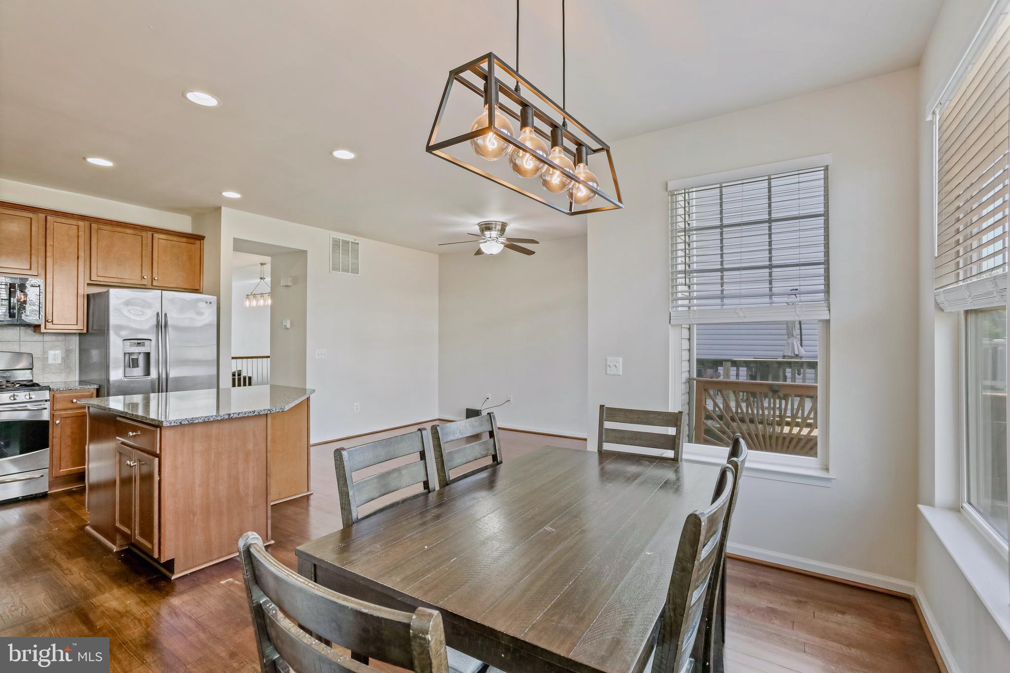 123 Short Branch Road Stafford, VA 22556 - Photo 10 of 33 a view of a dining room with furniture window and wooden floor