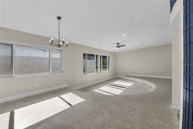 a kitchen with cabinets stainless steel appliances and a sink