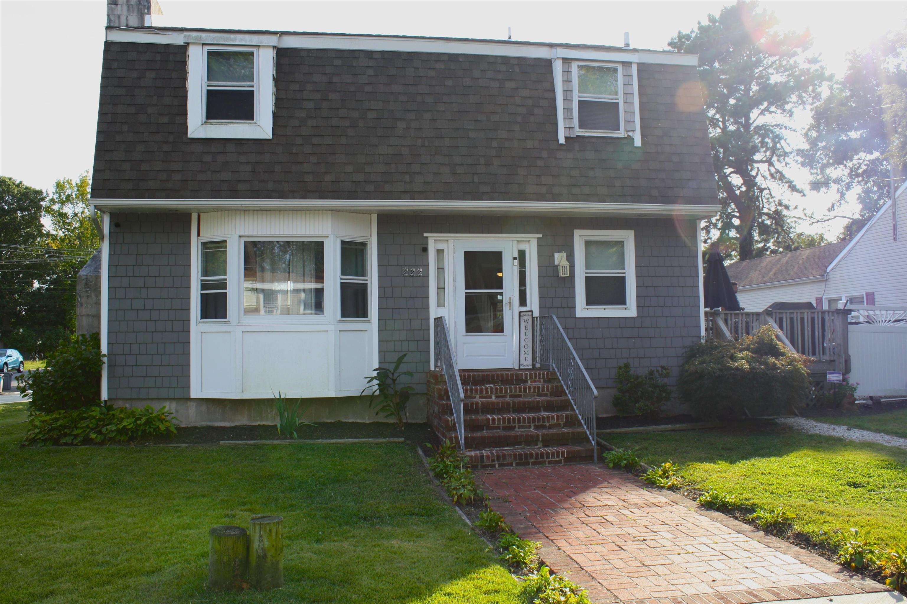 222 East Weber Avenue Villas, NJ 08251 - Photo 1 of 11 a front view of a house with a yard