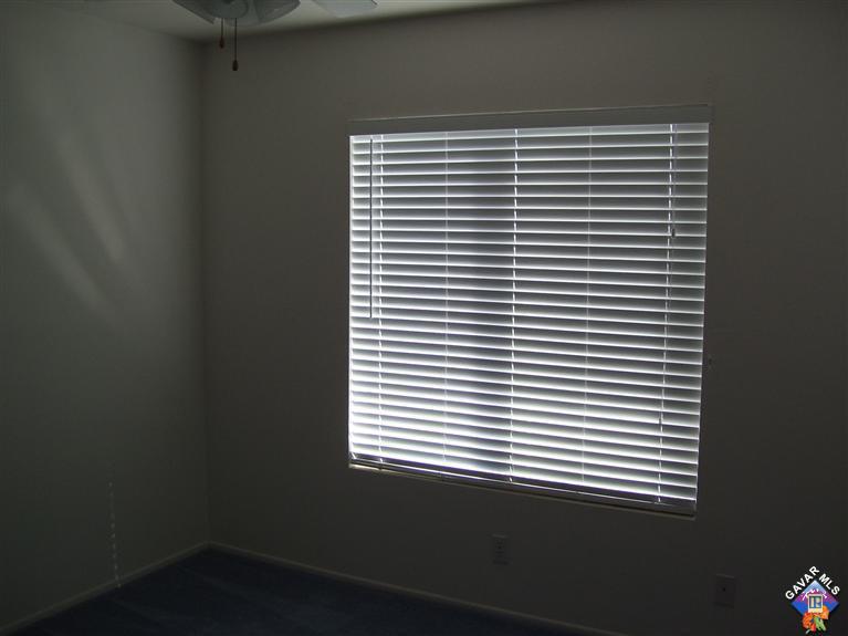 2602 Summerchase Avenue Rosamond, CA 93560 - Photo 13 of 16 a view of a room that has a window