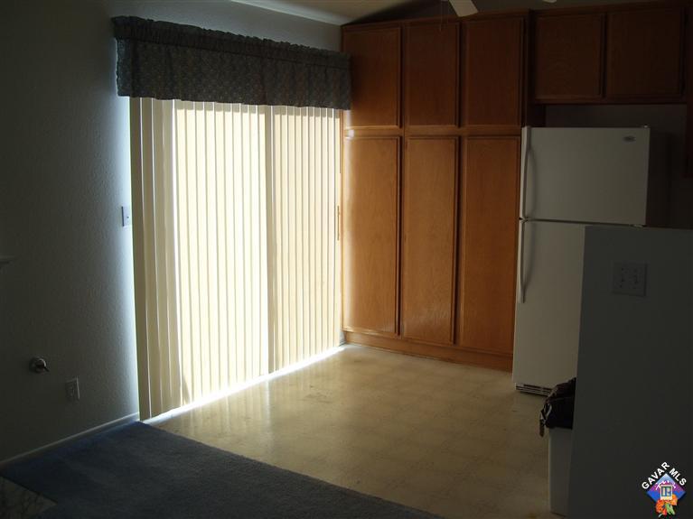 2602 Summerchase Avenue Rosamond, CA 93560 - Photo 7 of 16 a view of empty room with a window