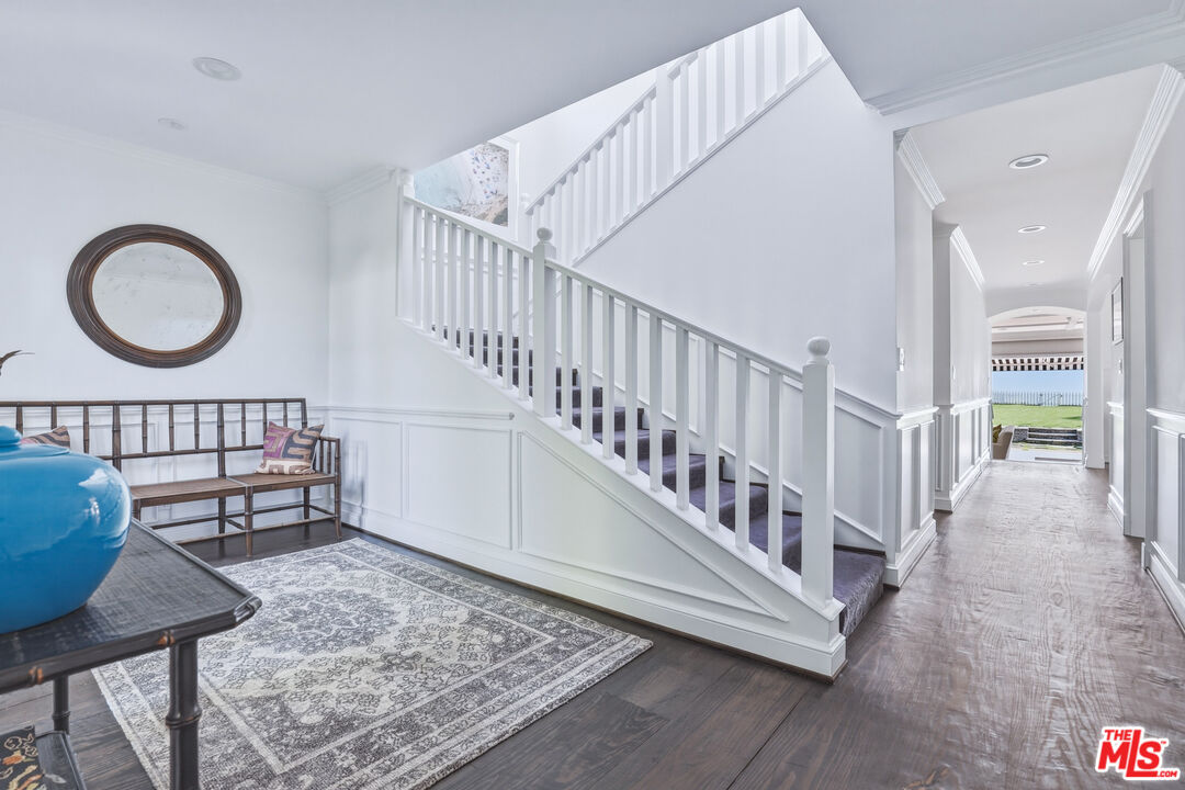 30810 Broad Beach Road Malibu, CA 90265 - Photo 12 of 55 a view of entryway with wooden floor and a table