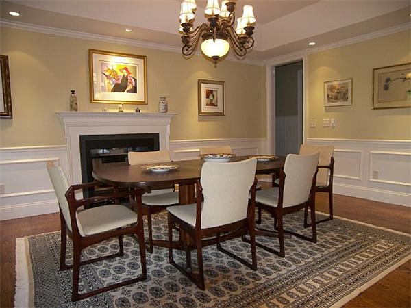 80 Laurel Road Bolton, MA 01740 - Photo 12 of 23 a dining room with furniture a chandelier and wooden floor