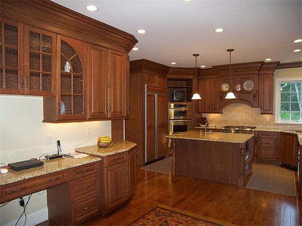 80 Laurel Road Bolton, MA 01740 - Photo 15 of 23 a kitchen with granite countertop a sink cabinets and stainless steel appliances