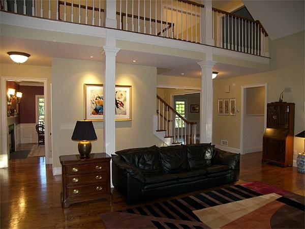 80 Laurel Road Bolton, MA 01740 - Photo 10 of 23 a living room with furniture and wooden floor