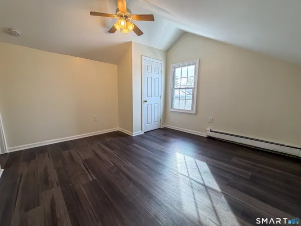 a view of livingroom with hardwood floor and window
