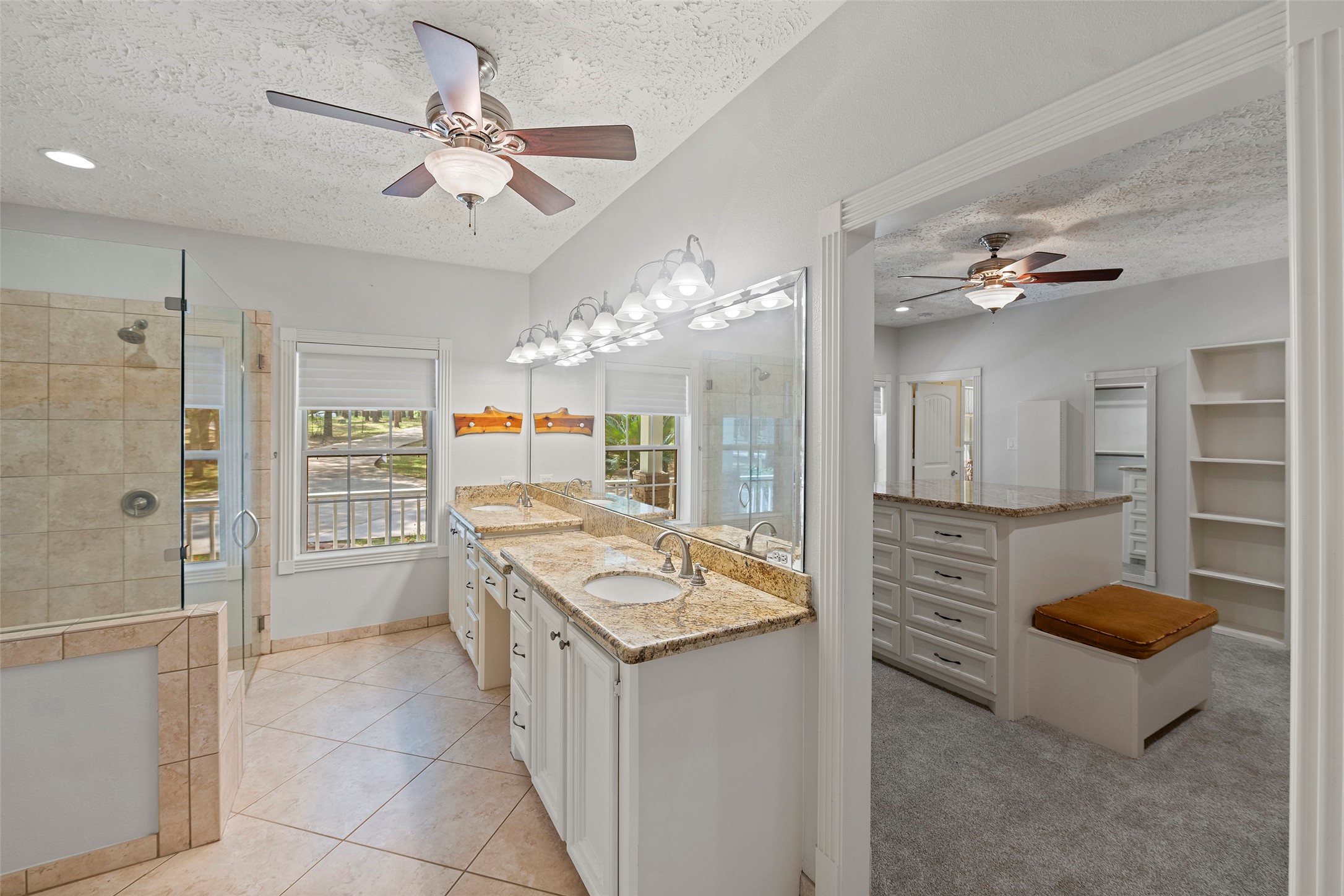 519 Dodge-Oakhurst Road Huntsville, TX 77320 - Photo 24 of 50 a kitchen with stainless steel appliances granite countertop a sink and a refrigerator