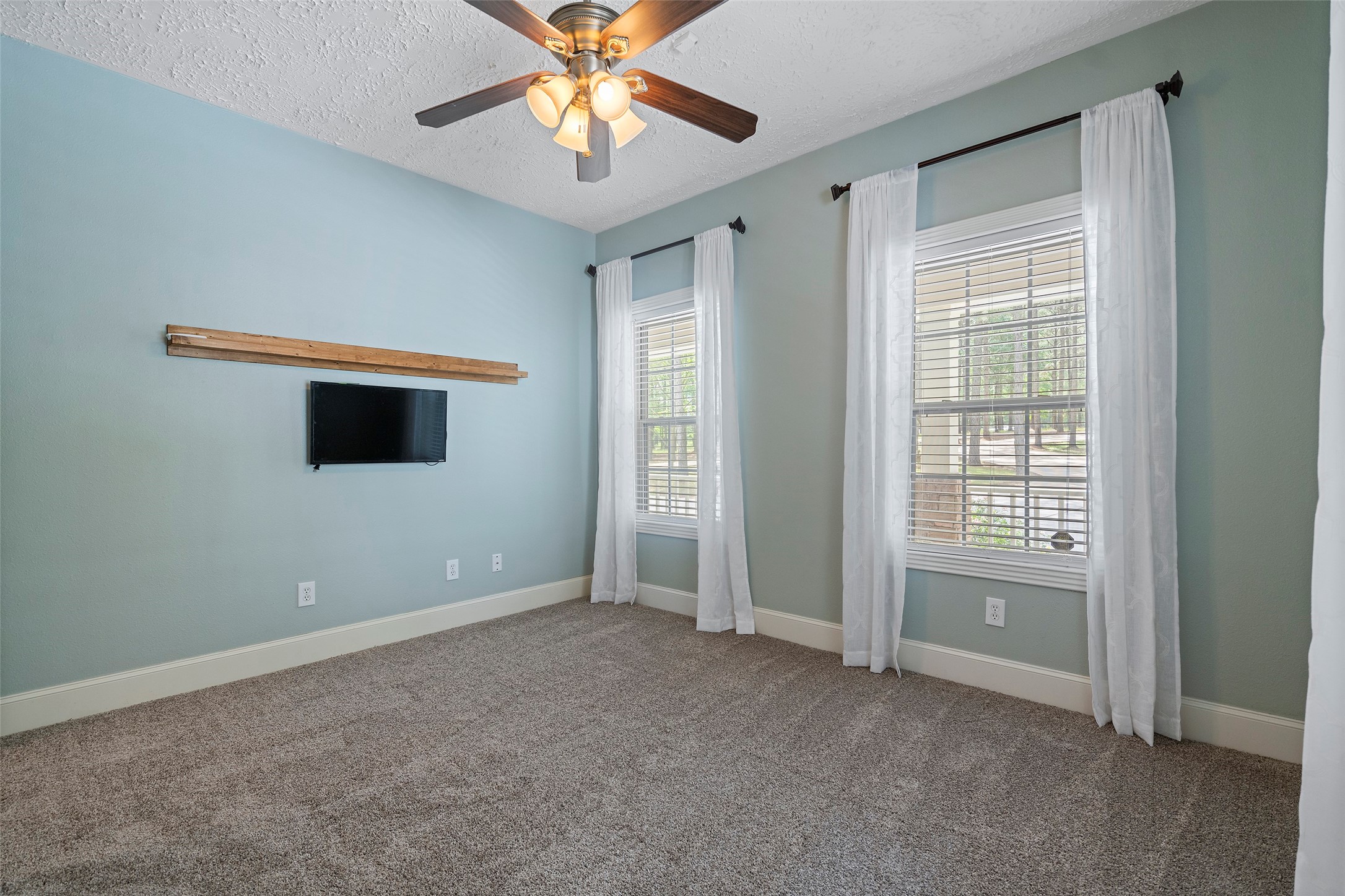 519 Dodge-Oakhurst Road Huntsville, TX 77320 - Photo 27 of 50 a view of an empty room with a window