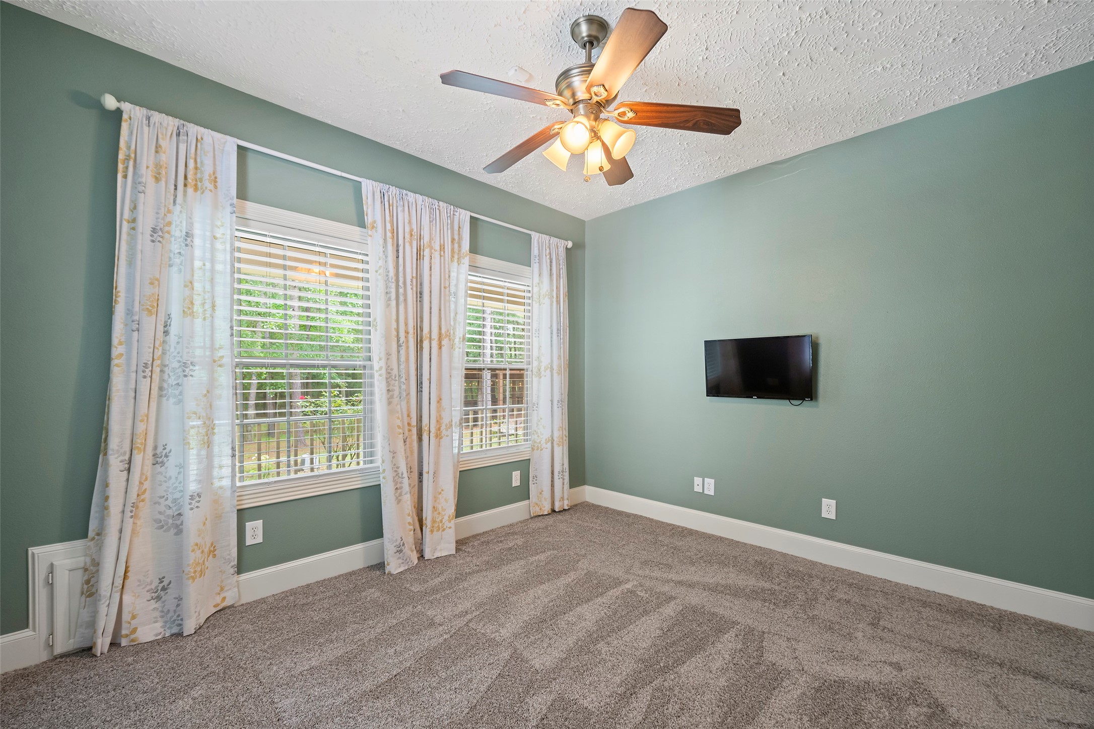 519 Dodge-Oakhurst Road Huntsville, TX 77320 - Photo 30 of 50 a view of an empty room with a window