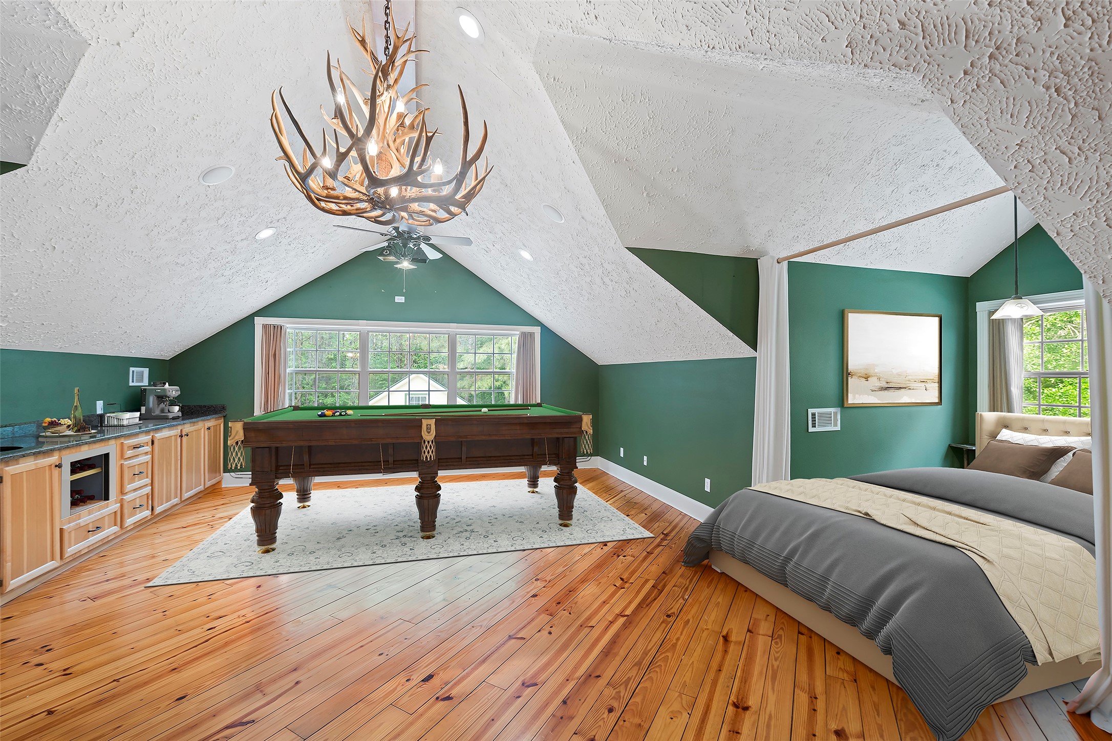 519 Dodge-Oakhurst Road Huntsville, TX 77320 - Photo 32 of 50 a bedroom with a bed and a chandelier