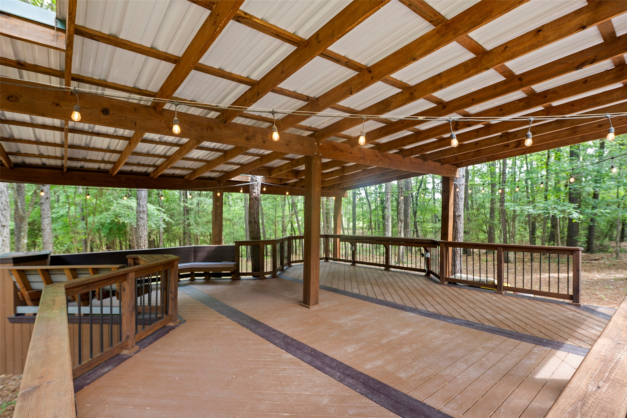519 Dodge-Oakhurst Road Huntsville, TX 77320 - Photo 44 of 50 a view of a porch with wooden floor