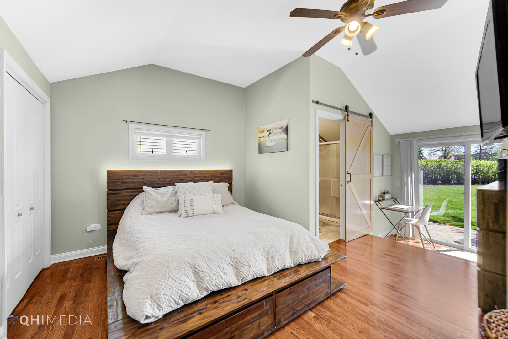 509 4th Street Lemont, IL 60439 - Photo 12 of 34 a bedroom with a bed and a chandelier