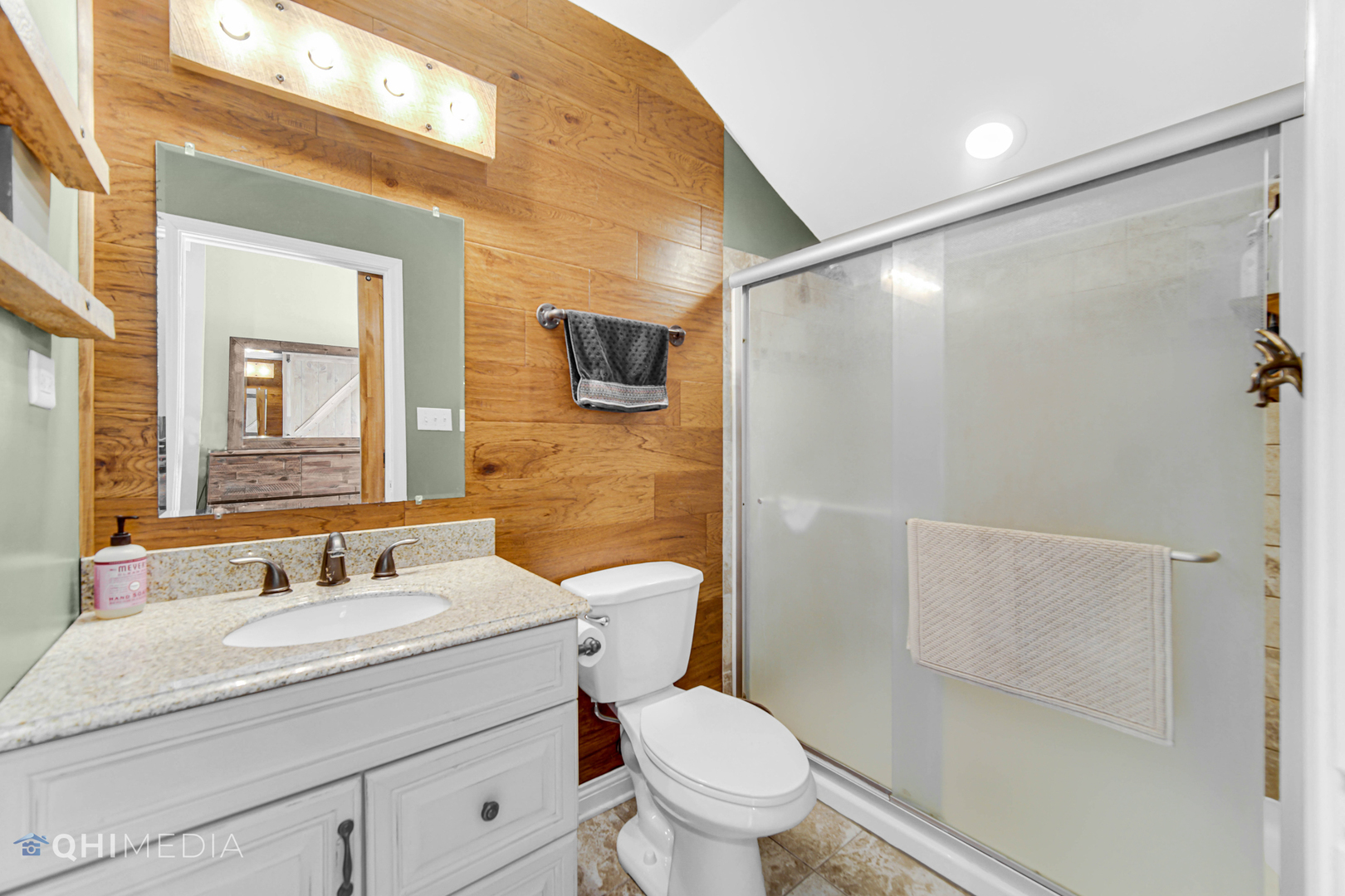 509 4th Street Lemont, IL 60439 - Photo 14 of 34 a bathroom with a granite countertop sink toilet and shower