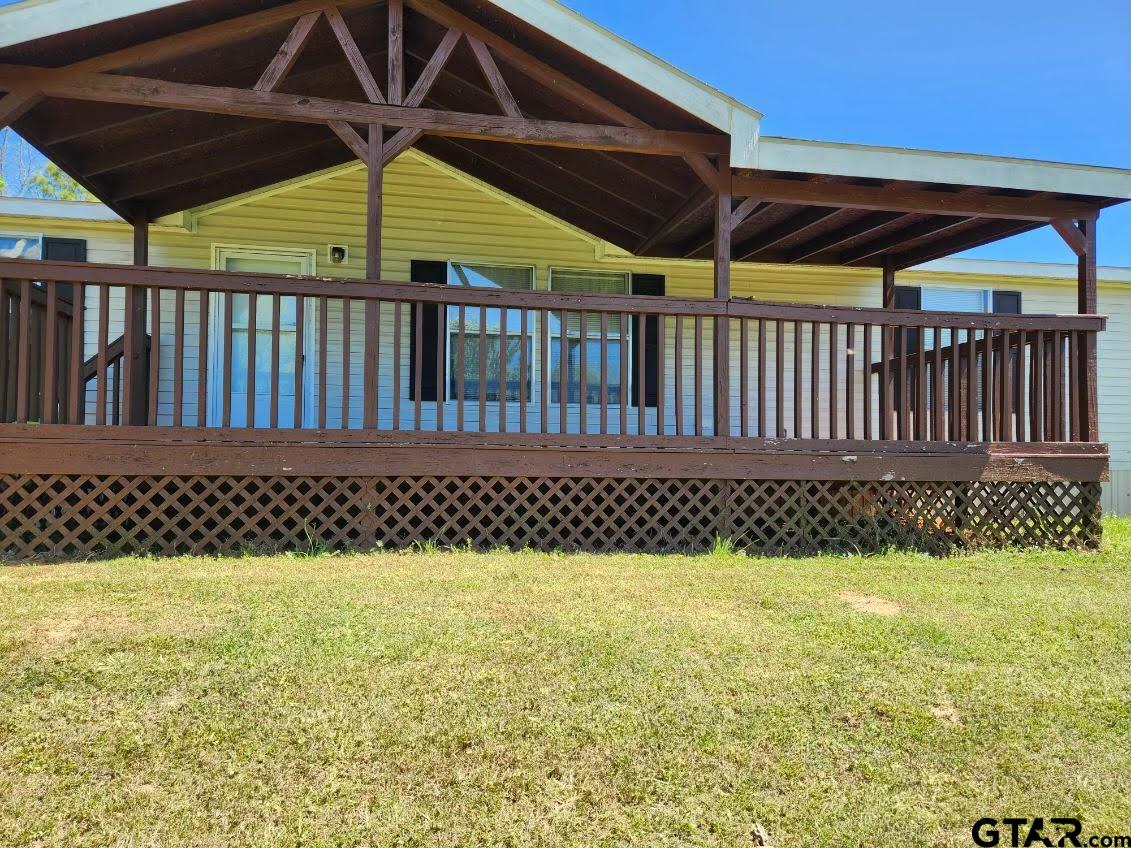 a view of a backyard with a small pool