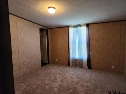 an empty room with a natural light