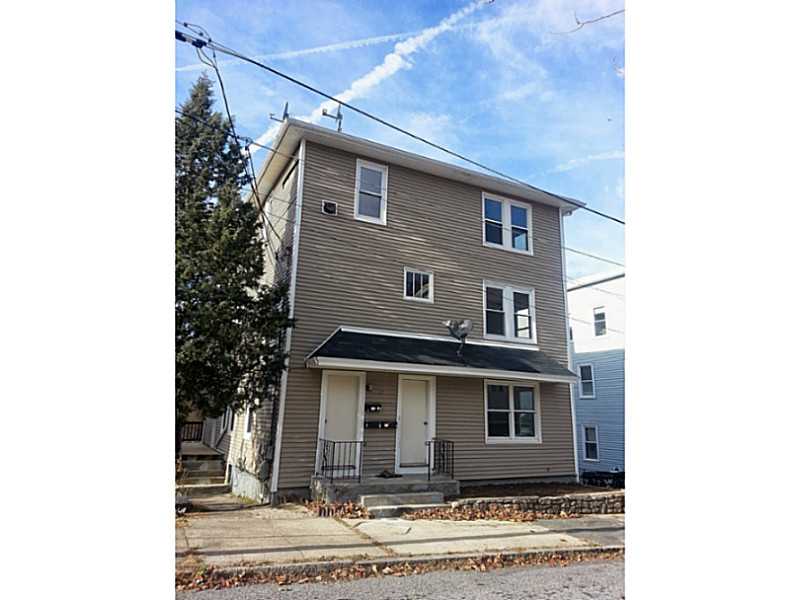 15 Ward Street Woonsocket, RI 02895 - Photo 1 of 10 Exterior Front. Vinyl sided, replacement windows.